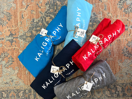 $10 Mystery Logo Tee